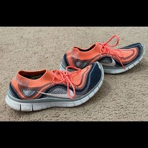 Nike free sneakers. All over knit. Very comfortable.